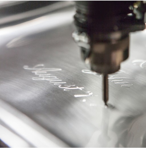 Example of bright-cut engraving on a sterling silver surface